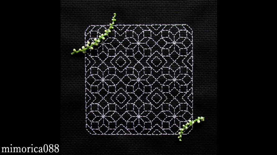 花の刺繍の幾何学模様 Geometric pattern of flowers embroidery.